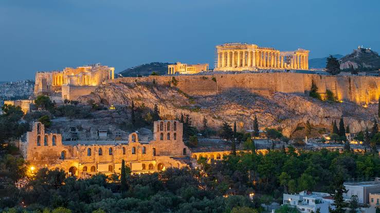 The Acropolis and Odeon of Herodes Atticus lit up at dusk