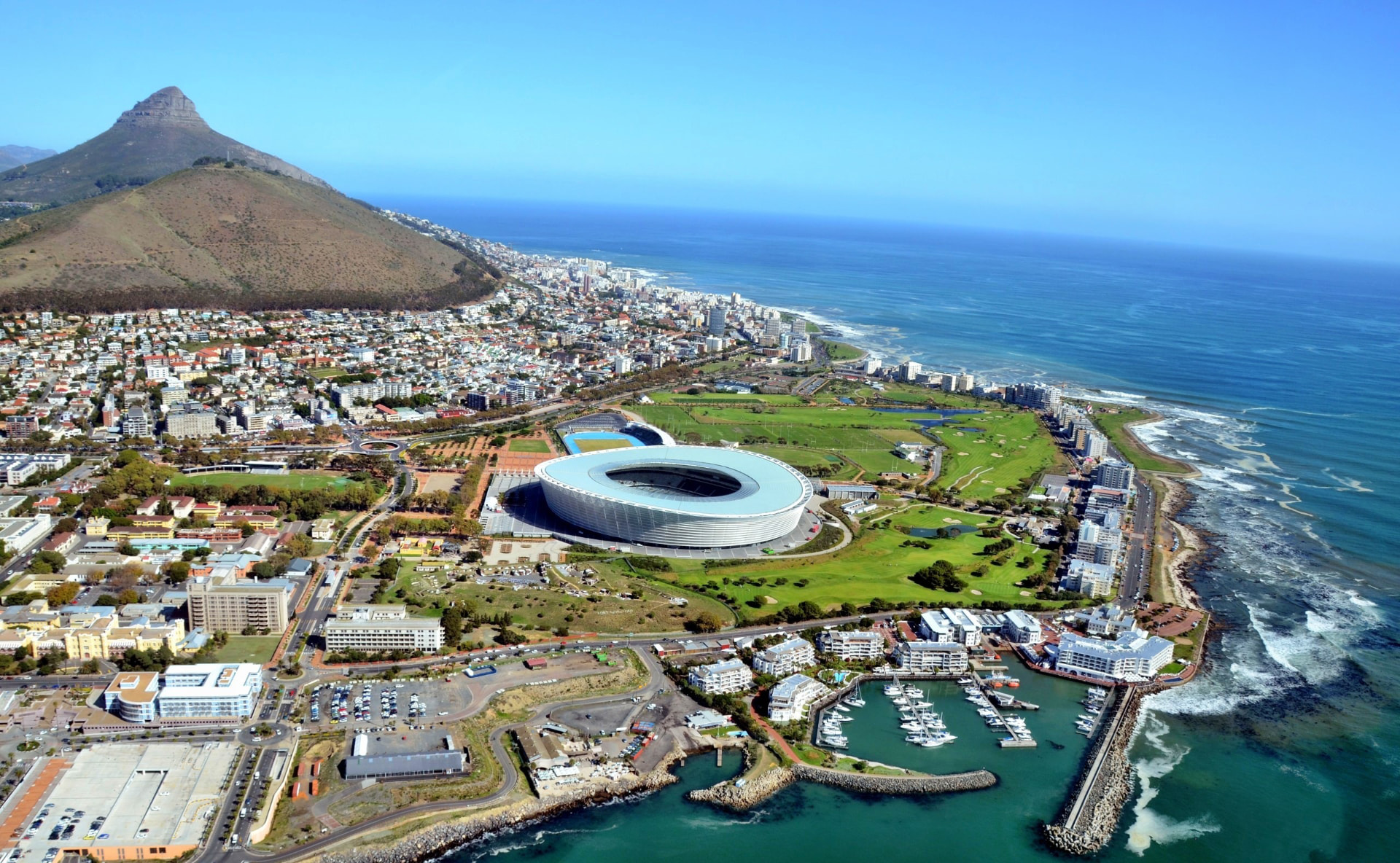 Aerial view of Cape Town Stadium, Lion’s Head and the Atlantic coastline