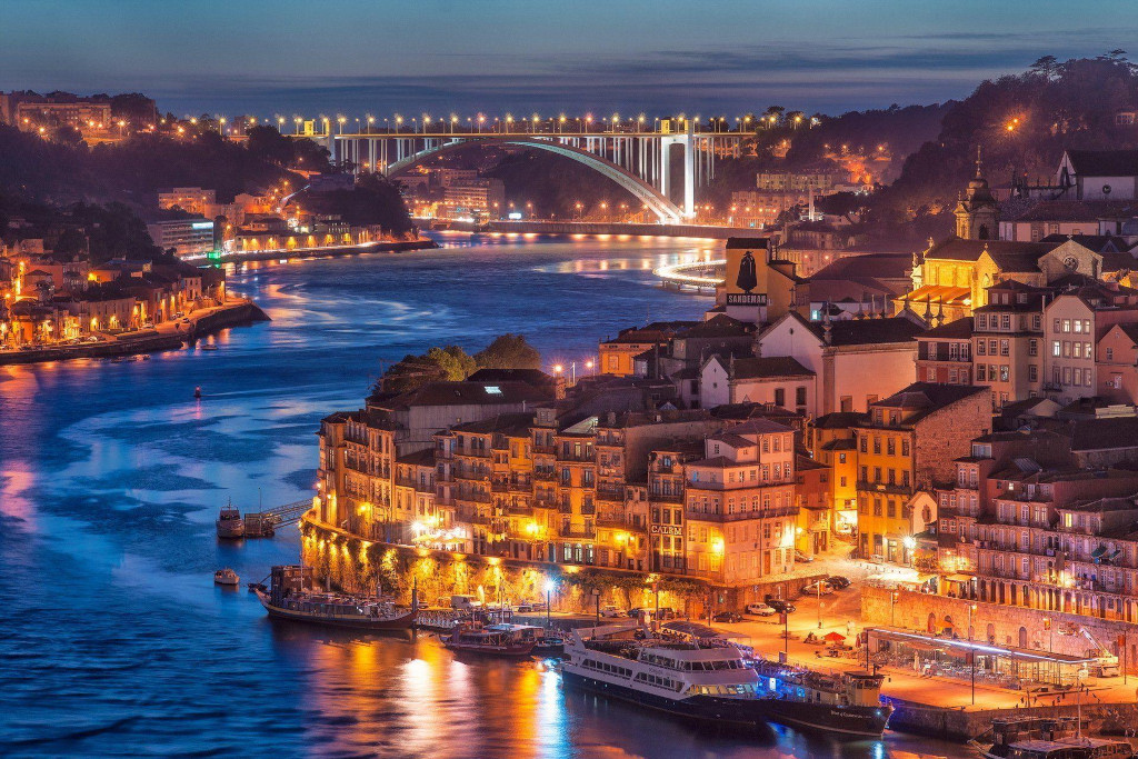 Porto’s Ribeira district and the Douro River illuminated at night